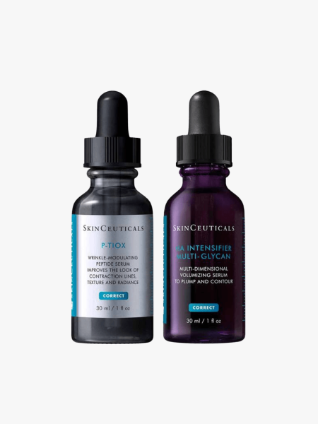 Two SkinCeutical bottles of P-Tiox and HA Intensifier Multi-Glycan serums on a light gray background